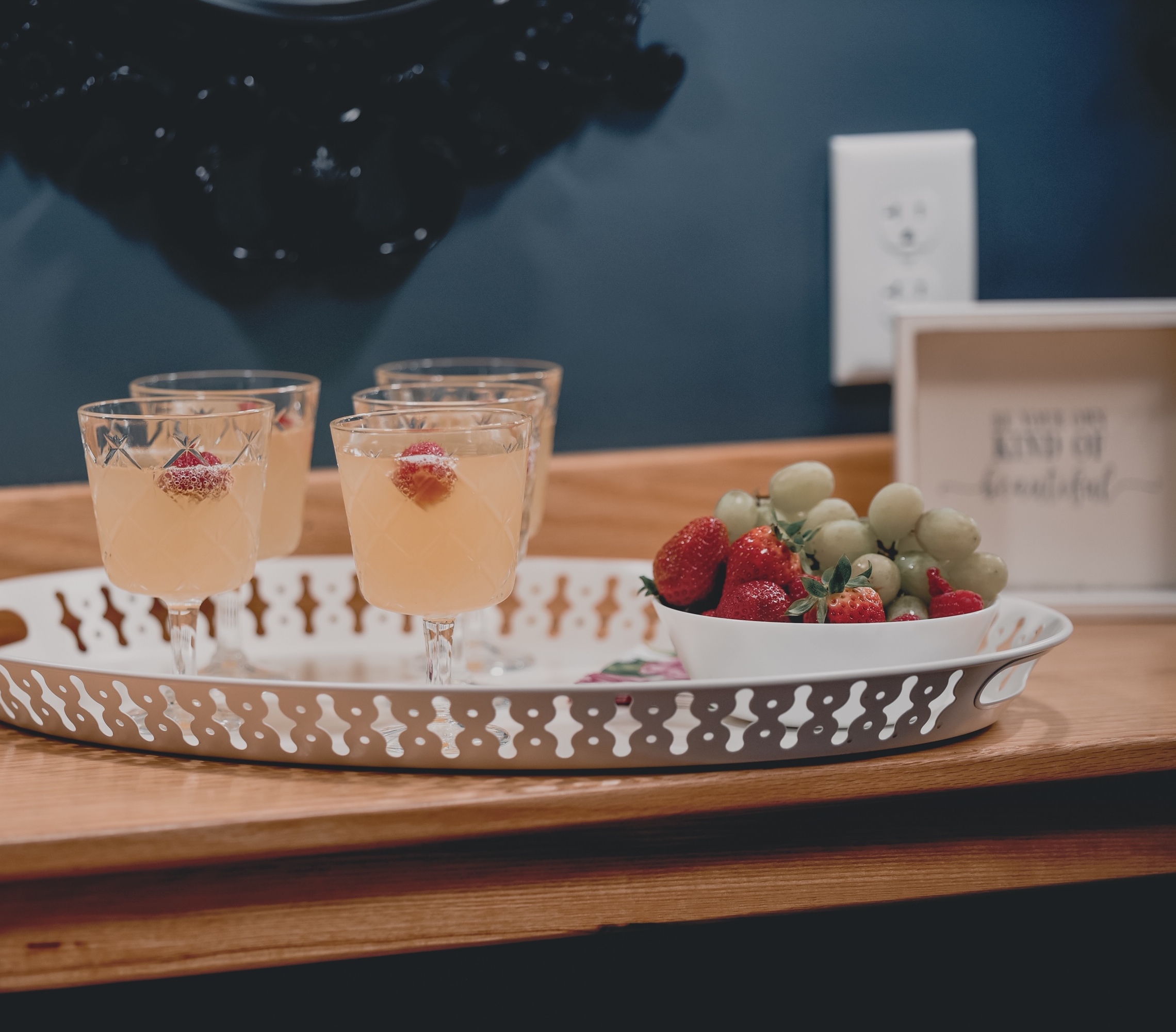 Welcome refreshments — mimosas and fresh fruit — set out in the Bridal House