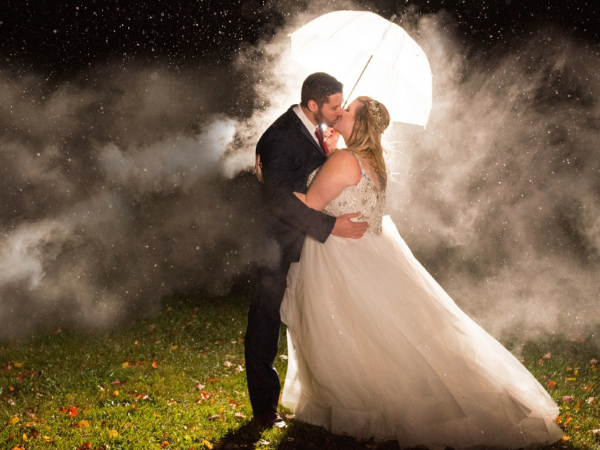 bride and groom at the moon backdrop